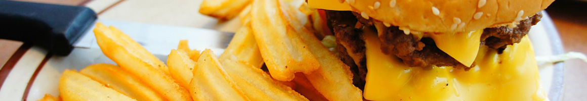 Eating Burger Fast Food Hot Dog at Detroit Coney Grill restaurant in Tempe, AZ.